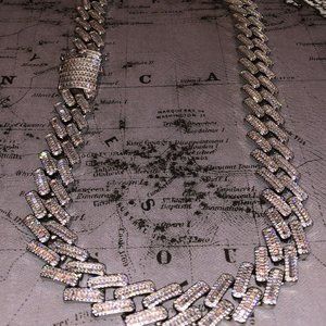 Blinged-out Cuban chain baguette stone setting